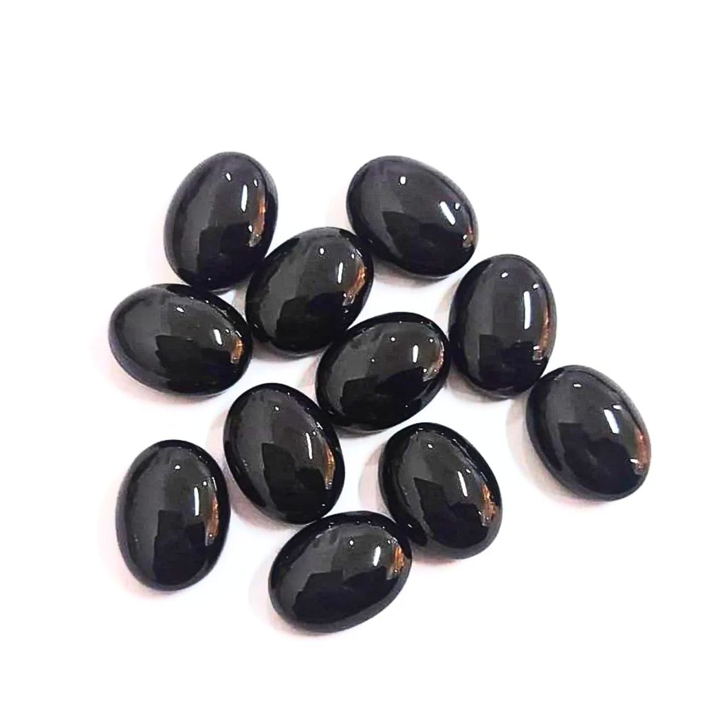 Natural Black Onyx Cabochon Oval Shape Fine Quality Loose Gemstone at Wholesale Rates (Rs 15/Carat)