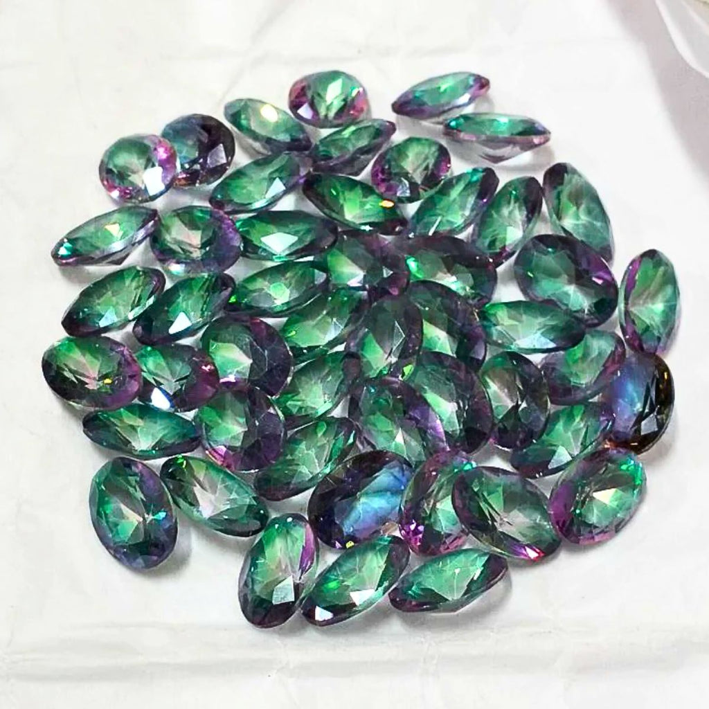 Natural Mystic Quartz Faceted Oval Shape Fine Quality Loose Gemstone at Wholesale Rates (Rs 25/Carat)