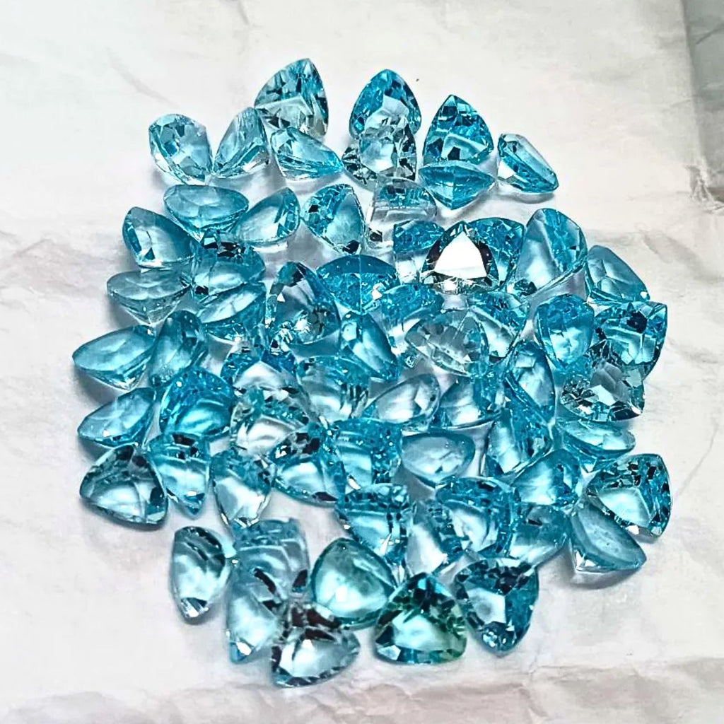 Natural Blue Topaz Trillion Shape Fine Quality Loose Gemstone at Wholesale Rates (Rs 125/Carat)