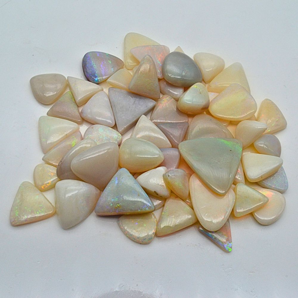Natural Fire Opal Trillion Shape Fine Quality Loose Gemstone at Wholesale Rates (Rs 650/Carat)